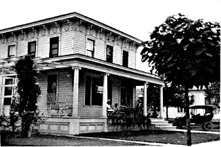 The Orrin Bacon house on Railroad Ave.  Railroad Ave. was renamed E. Lake Ave. This house was originally located at the intersection of Railroad Ave and S. Main St., about 6 blocks west of its current location and was moved here to clear a lot for a new house being built for Edw. Wittwer